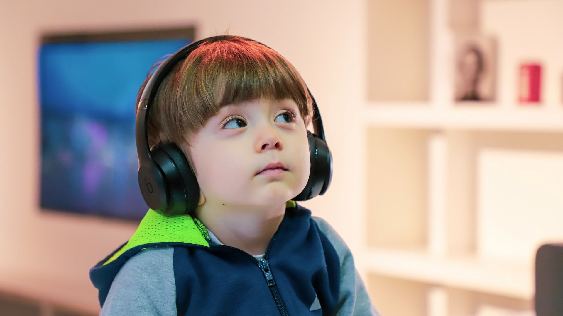 A child listening to a podcast